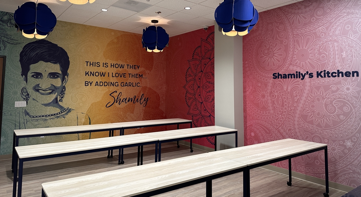 personalized sign with a mural of a woman in a business