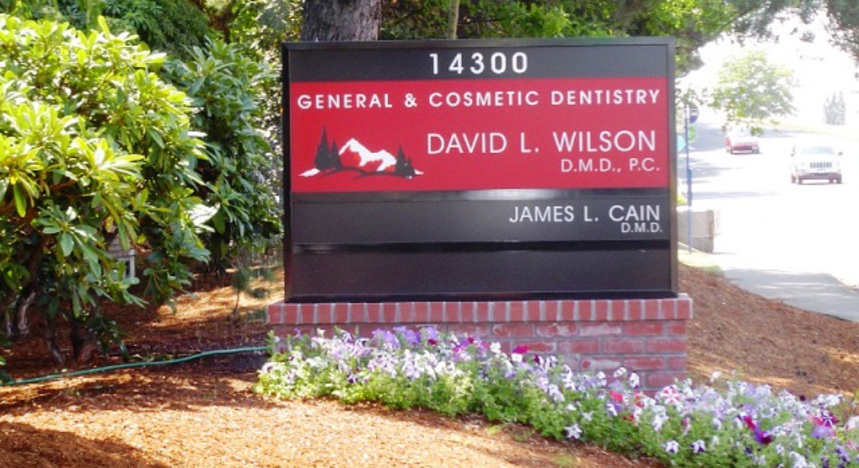 A monument sign helps people passing by locate a business