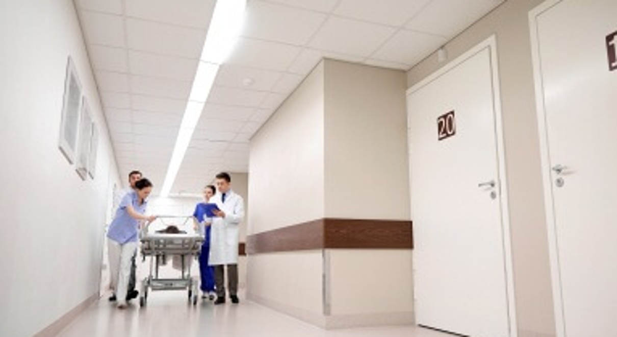 Patient Being Wheeled Into Emergency Room