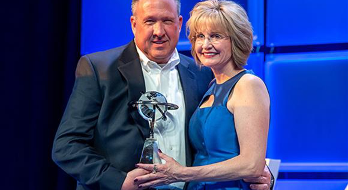 Doug Brauer with Catherine Monson receiving the Sales Achievement Award