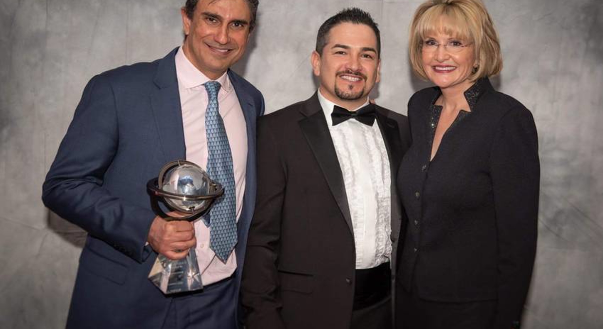 Franchise owners with award