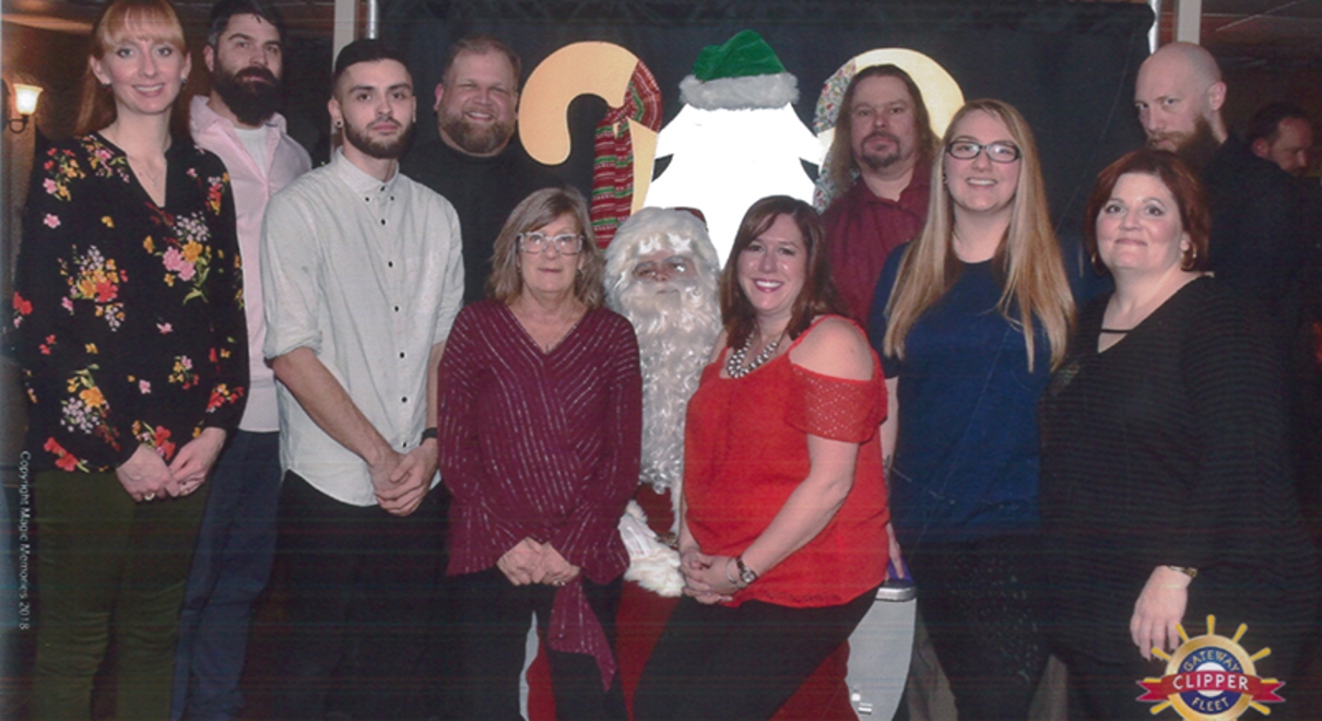 the team at fastsigns of south pittsburgh pose with santa