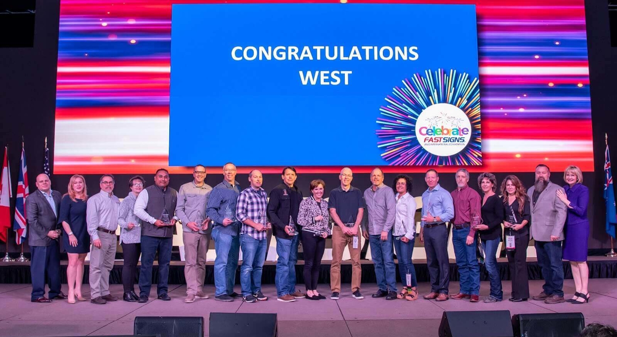 FASTSIGNS® of Fresno receiving an award