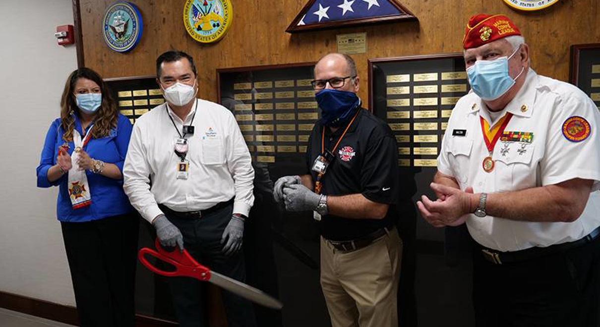 Fastsigns franchise owners with two veterans