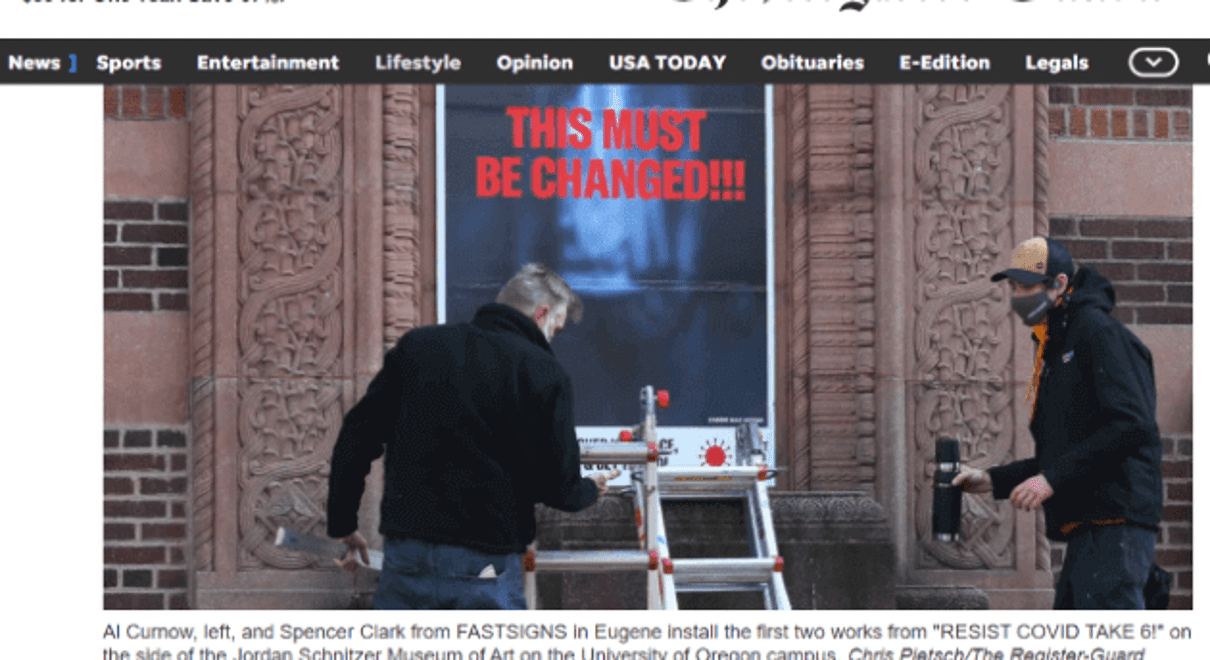 Fast sign eugene employee working on a wall graphic