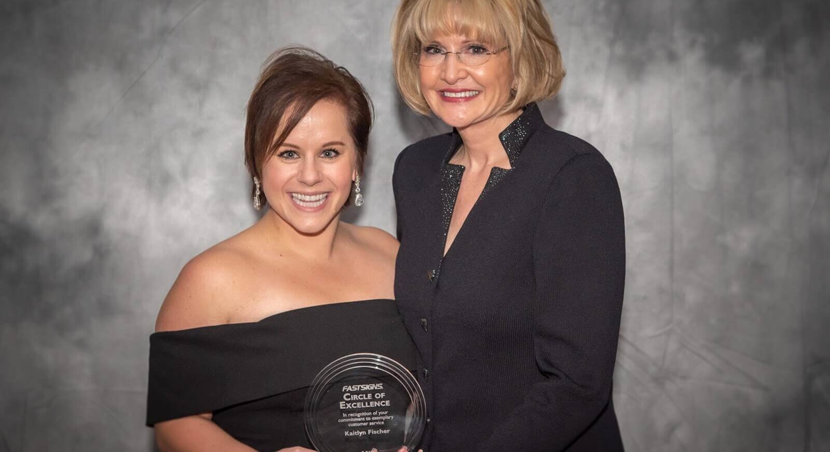 Kaitlyn Fischer receiving an award