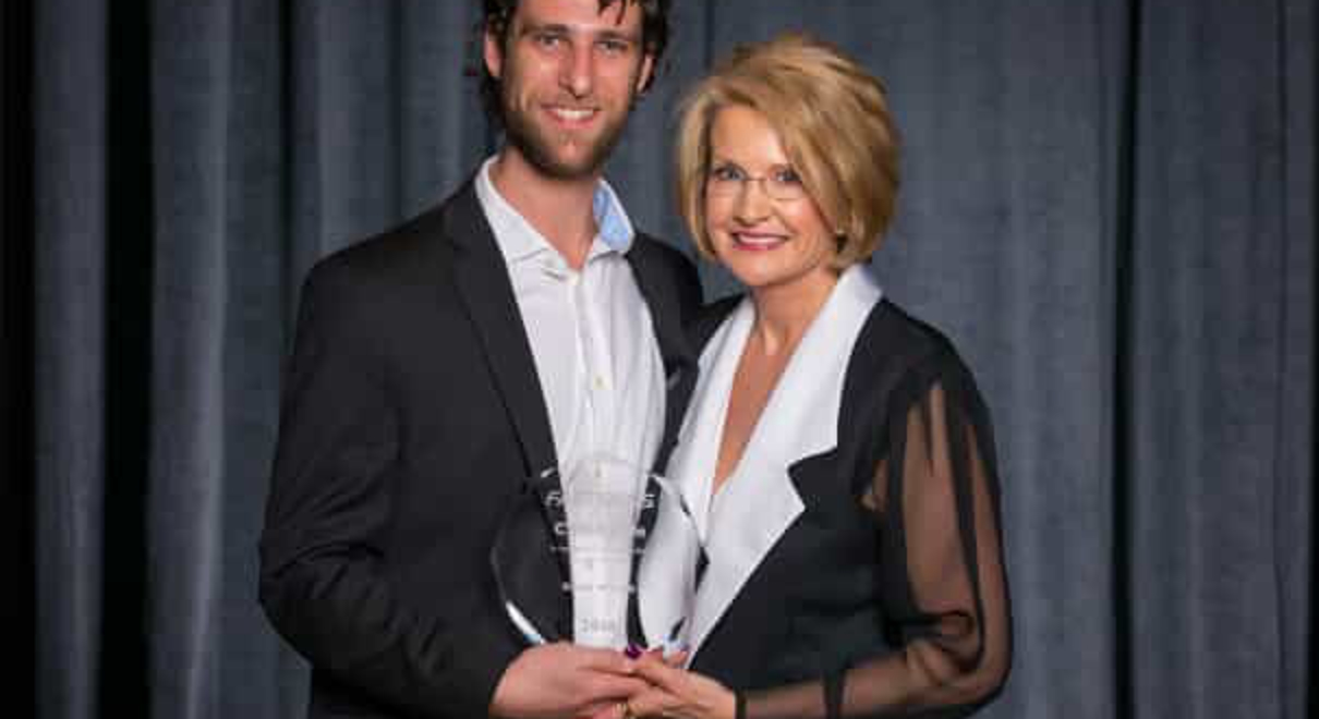 Kevin Wenck with FASTSIGNS CEO Catherine Monson