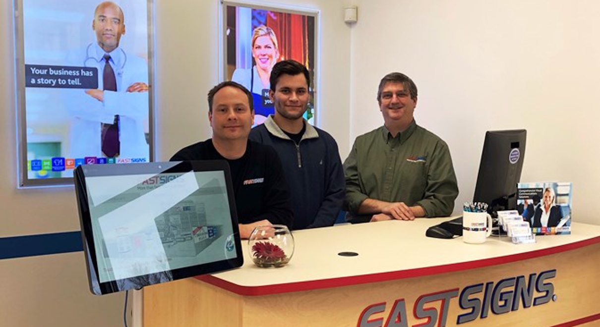 the team at FASTSIGNS of burlington VT