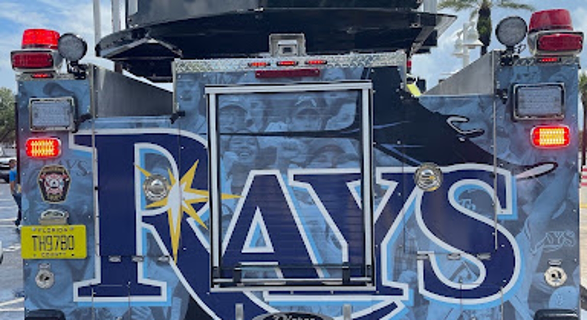a truck is decorated with rays themed wrap