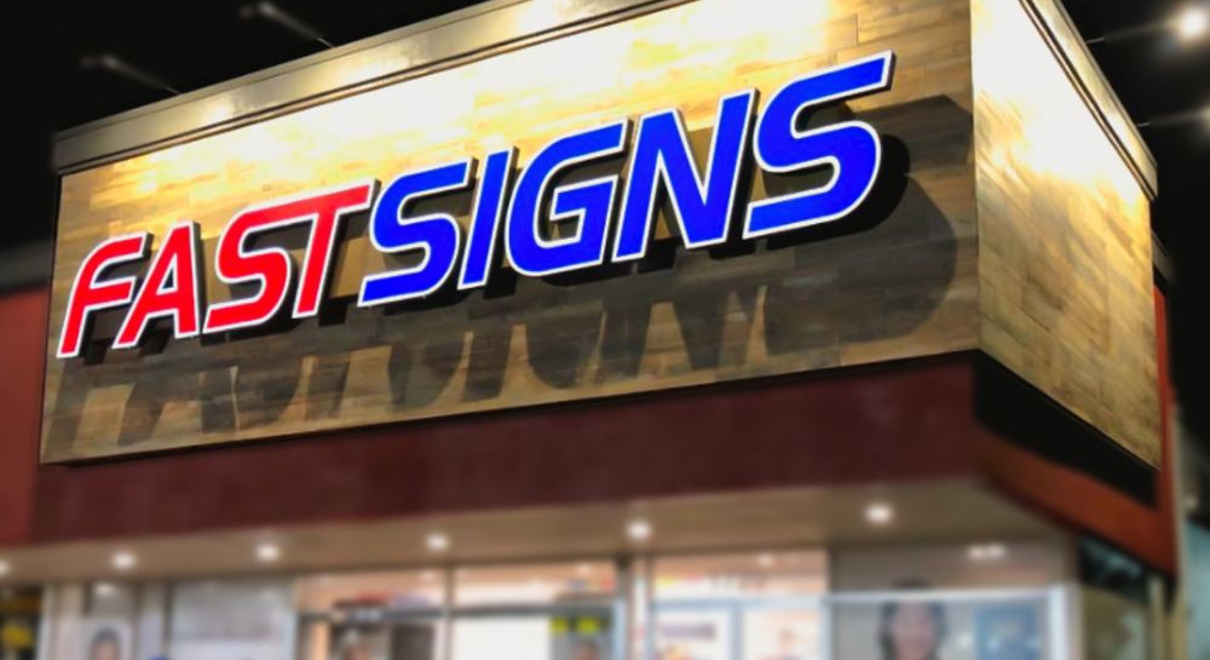 FASTSIGNS lights on a building