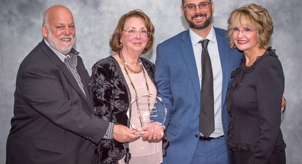 Franchise owners with award