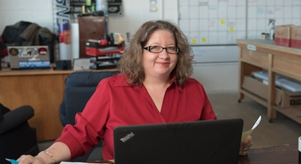 Melanie Hossler working at a desk