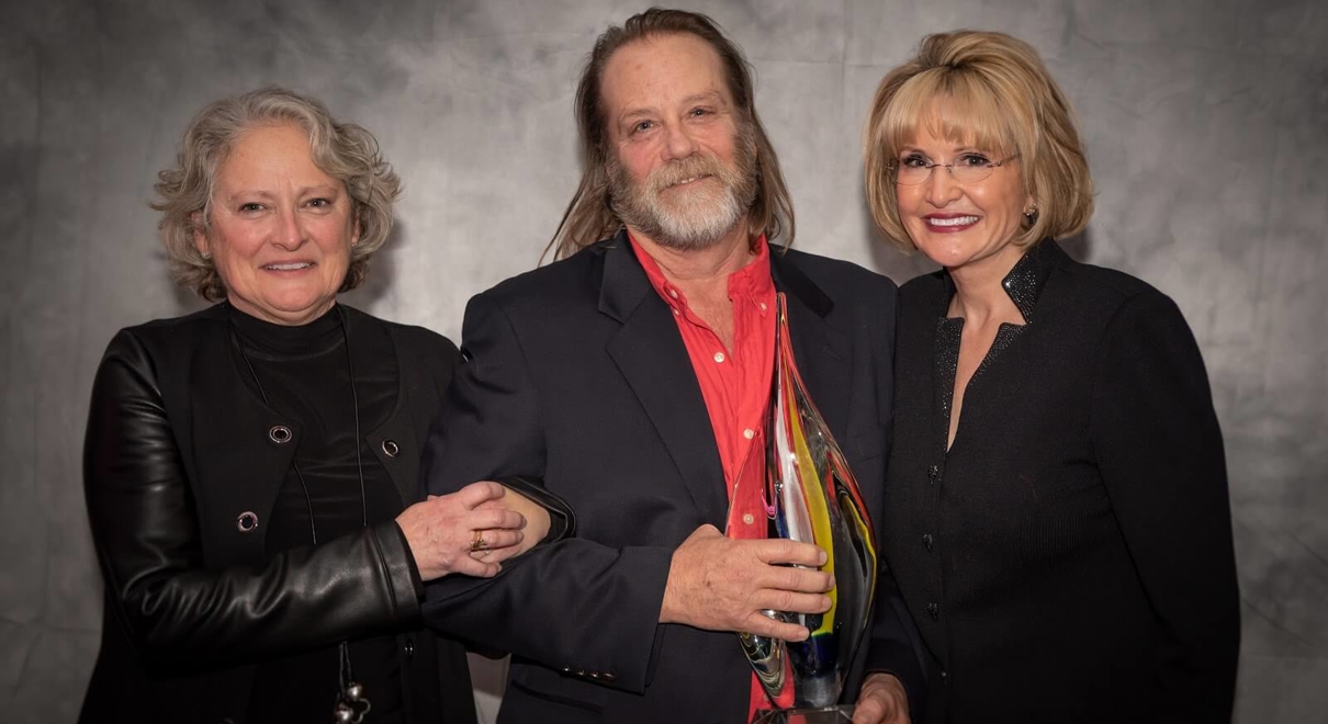 Franchise owners with award