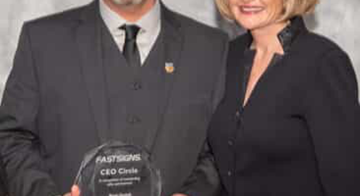 Rod Quick and Catherine Monson with his CEO Circle award
