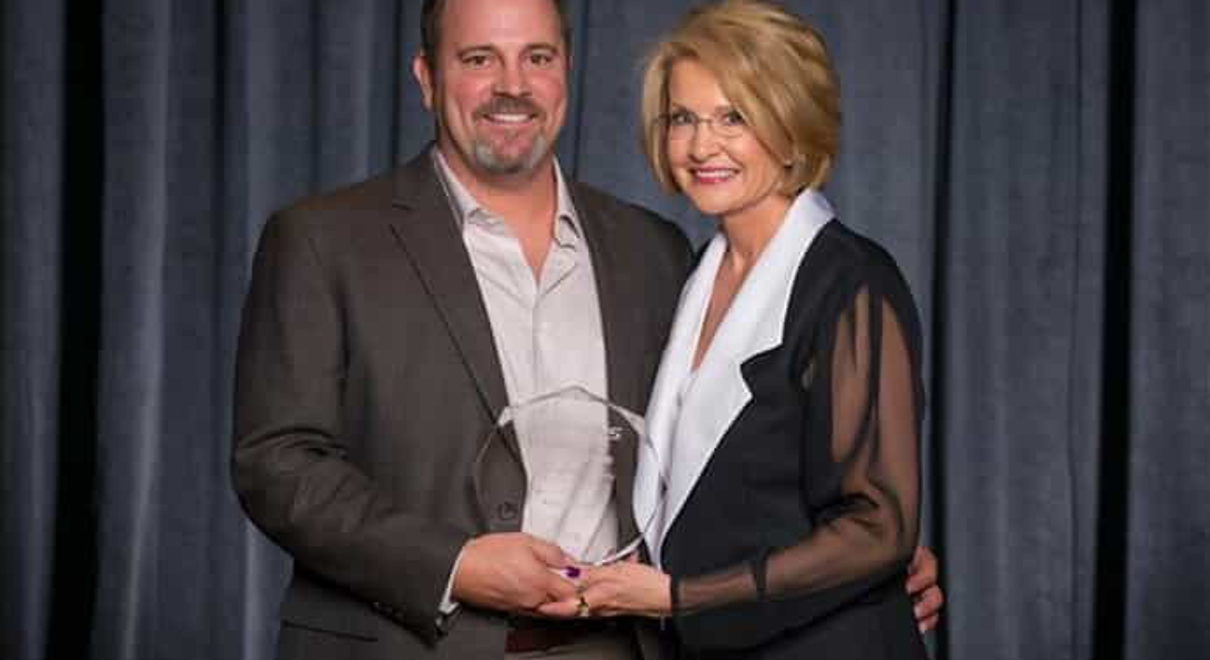 Rod Quick and Catherine Monson with his CEO Circle award