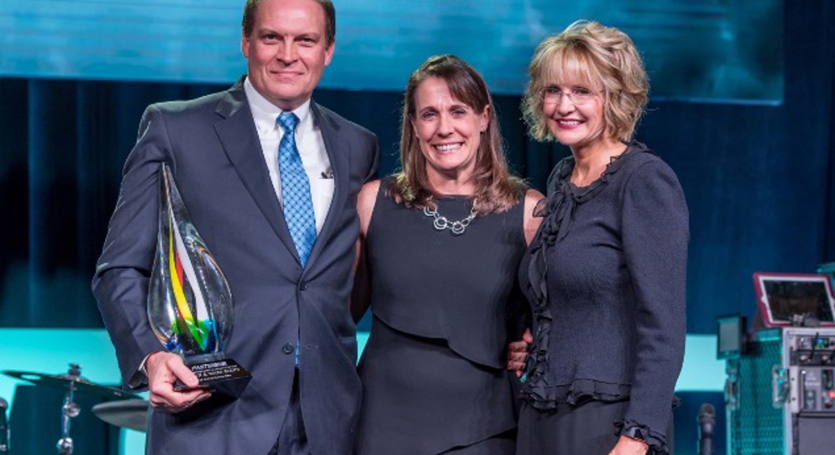 Franchise owners with award