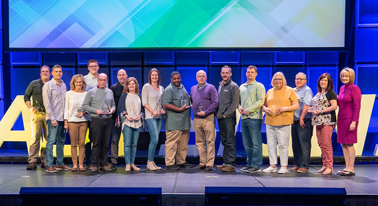 FASTSIGNS of mechanicsburg team receiving the Pinnacle Club Award