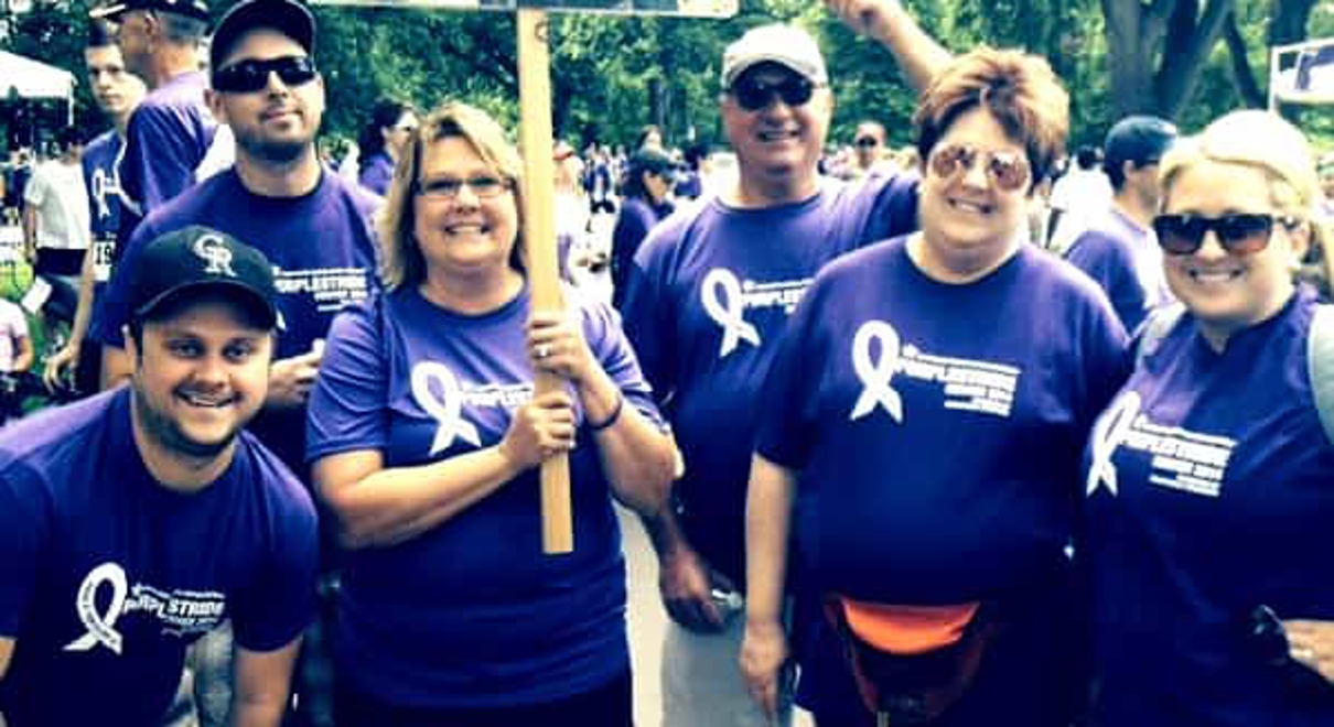 the fastsigns of midtown denver team at a purple stride walk