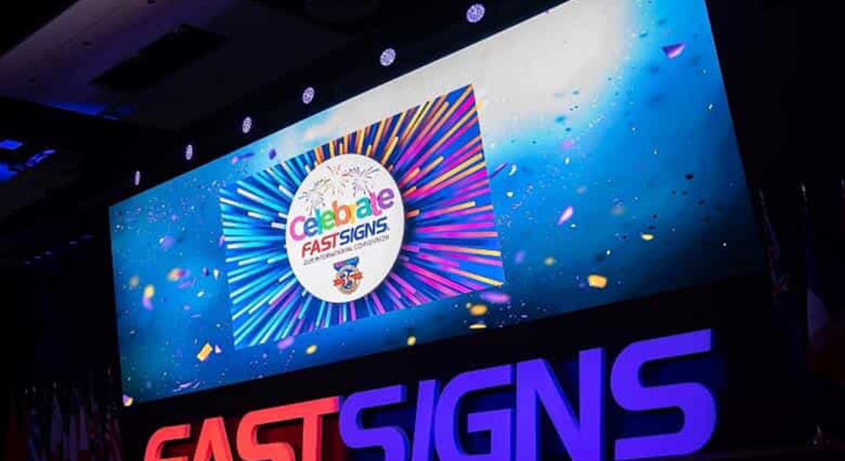 a screen at the FASTSIGNS convention