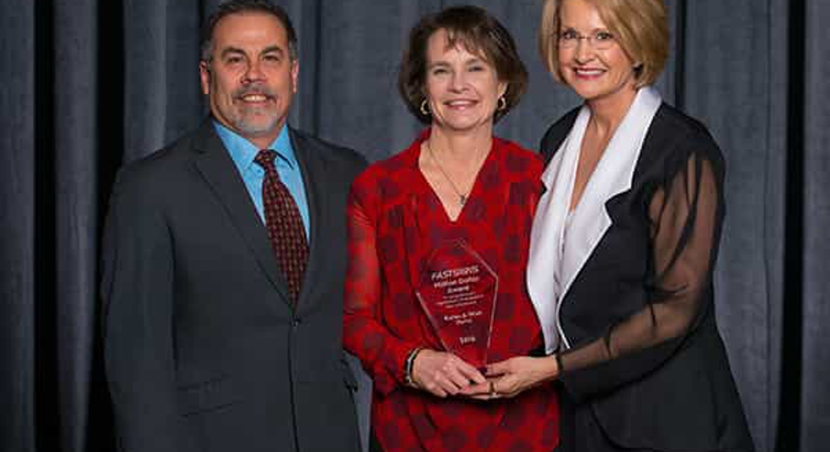 The owners of FASTSIGNS American Canyon pose with Catherine Monson