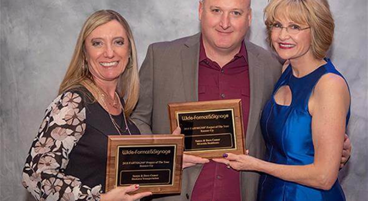 FASTSIGNS of Kankakee receiving an award