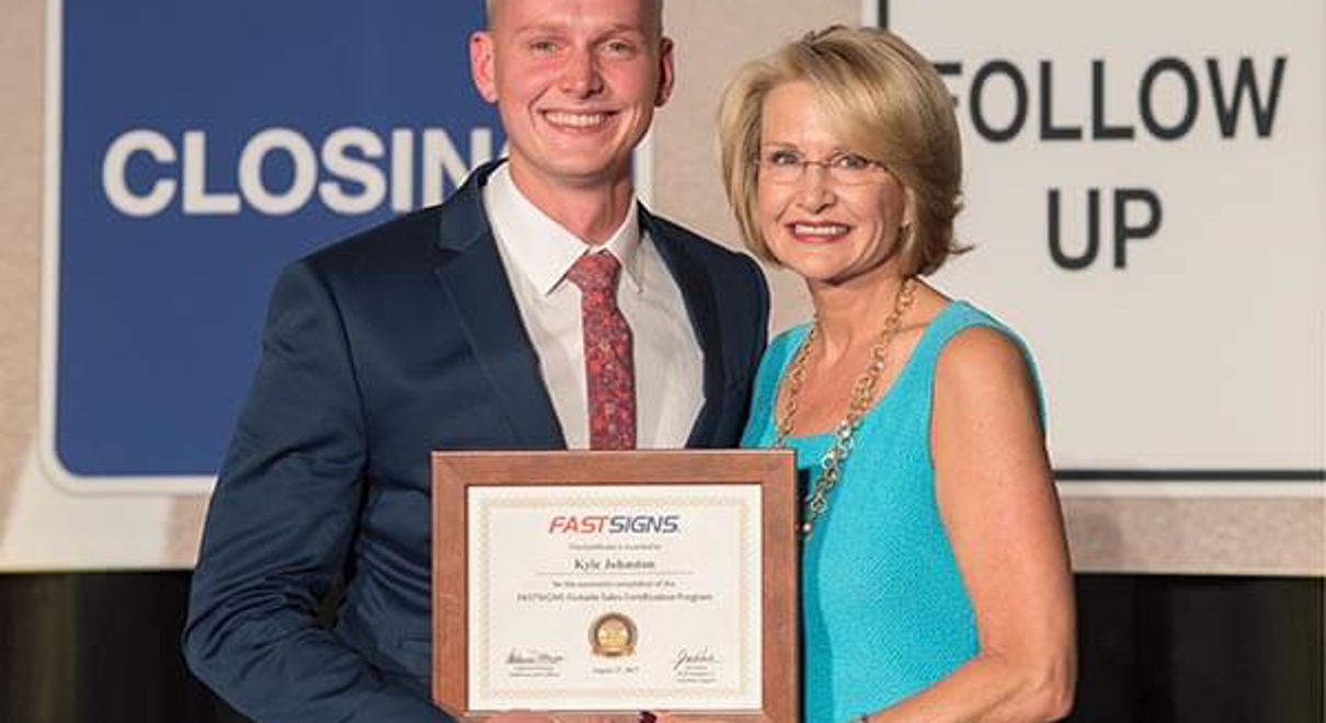 Kyle Johnston received the Outside Sales Certification Award at the 2017 FASTSIGNS Outside Sales Summit