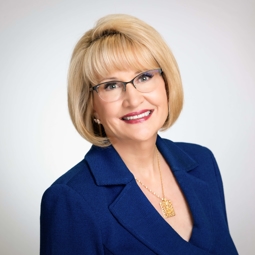 Headshot of Catherine Monson, CFE