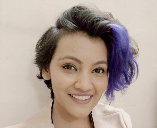 Headshot of Damara Dodhia