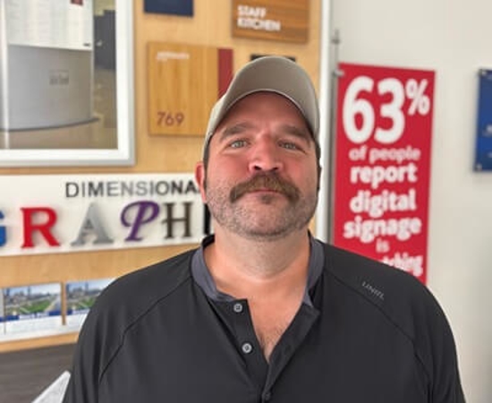 Headshot of Adam Trissell