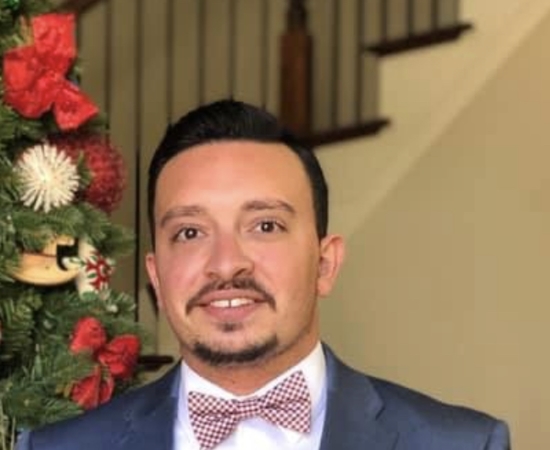 Headshot of Ryan de Lugo