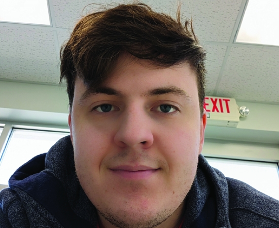 Headshot of Justin  Valk