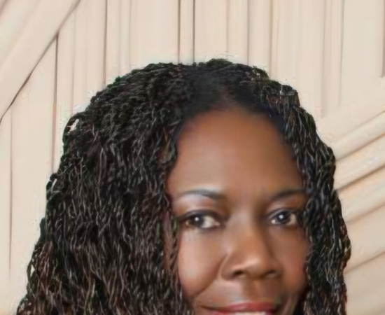 Headshot of Andrea Riley