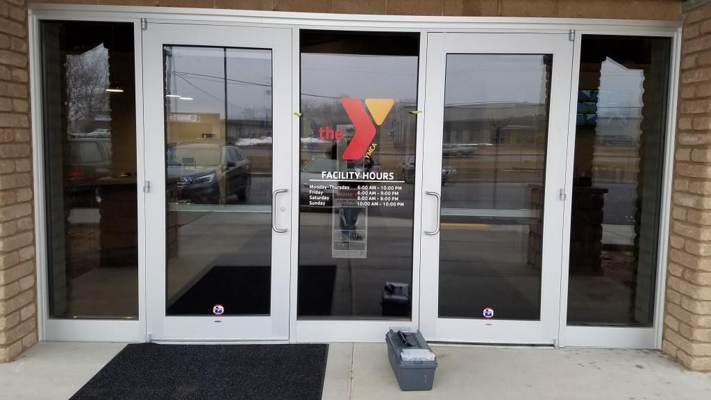 Exterior door graphic for The Y