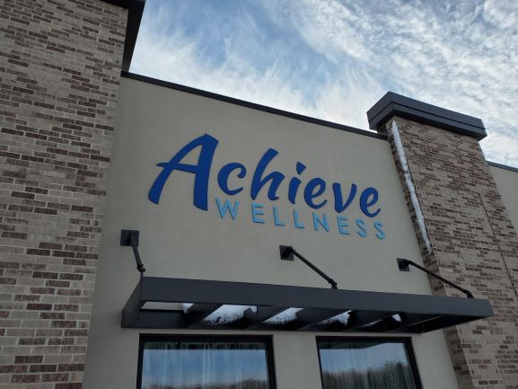 Exterior business signage for Achieve Wellness 