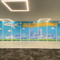 Wall Graphics with Plane Pulling a Banner
