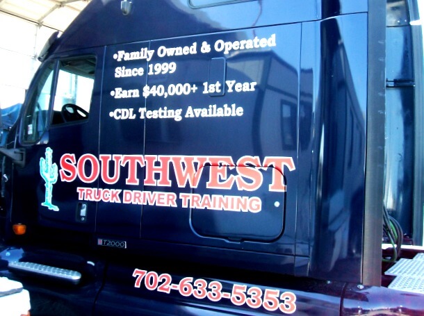 Black commercial vehicle with custom graphics