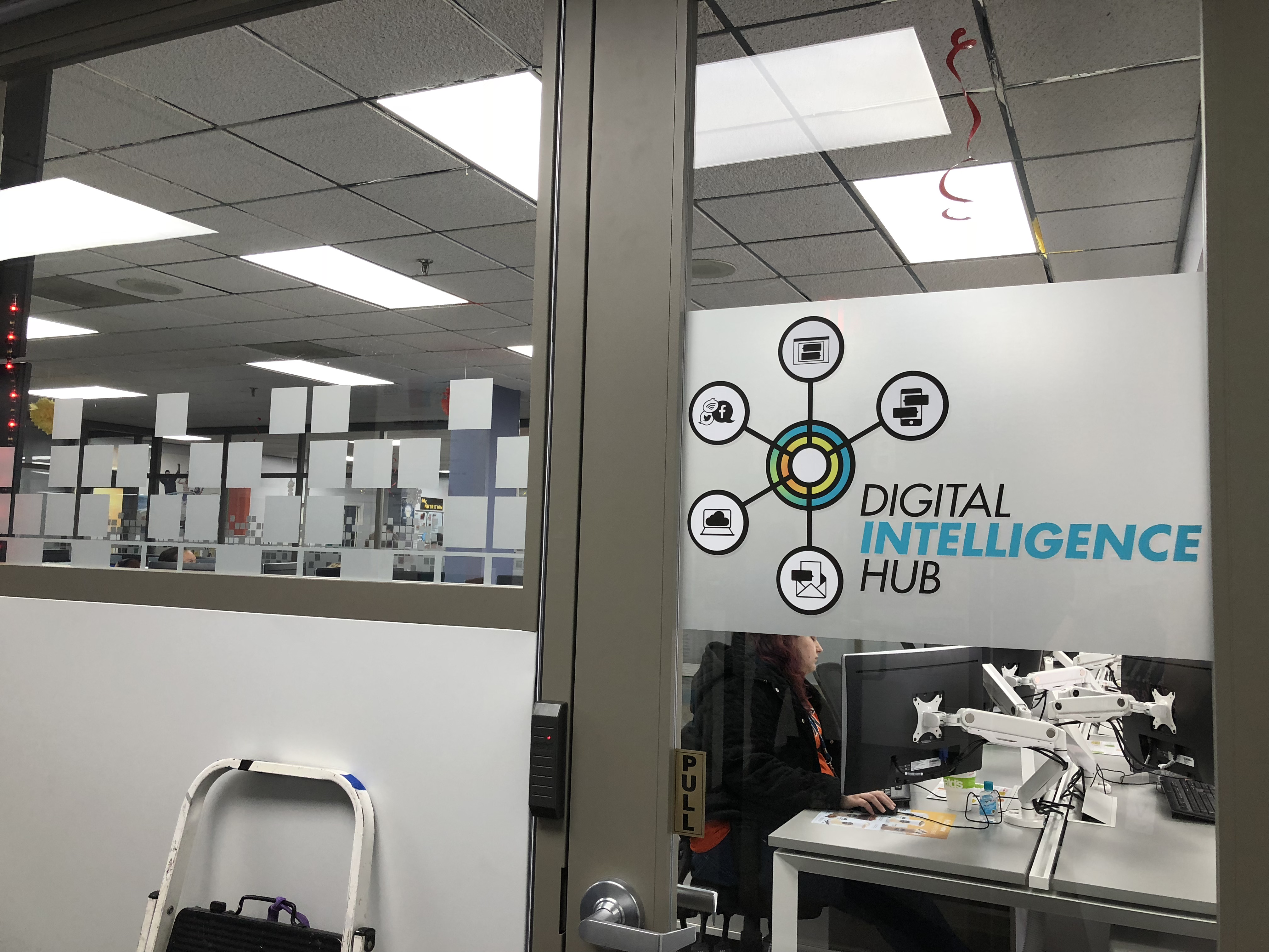 Interior door graphic for Digital Intelligence Hub