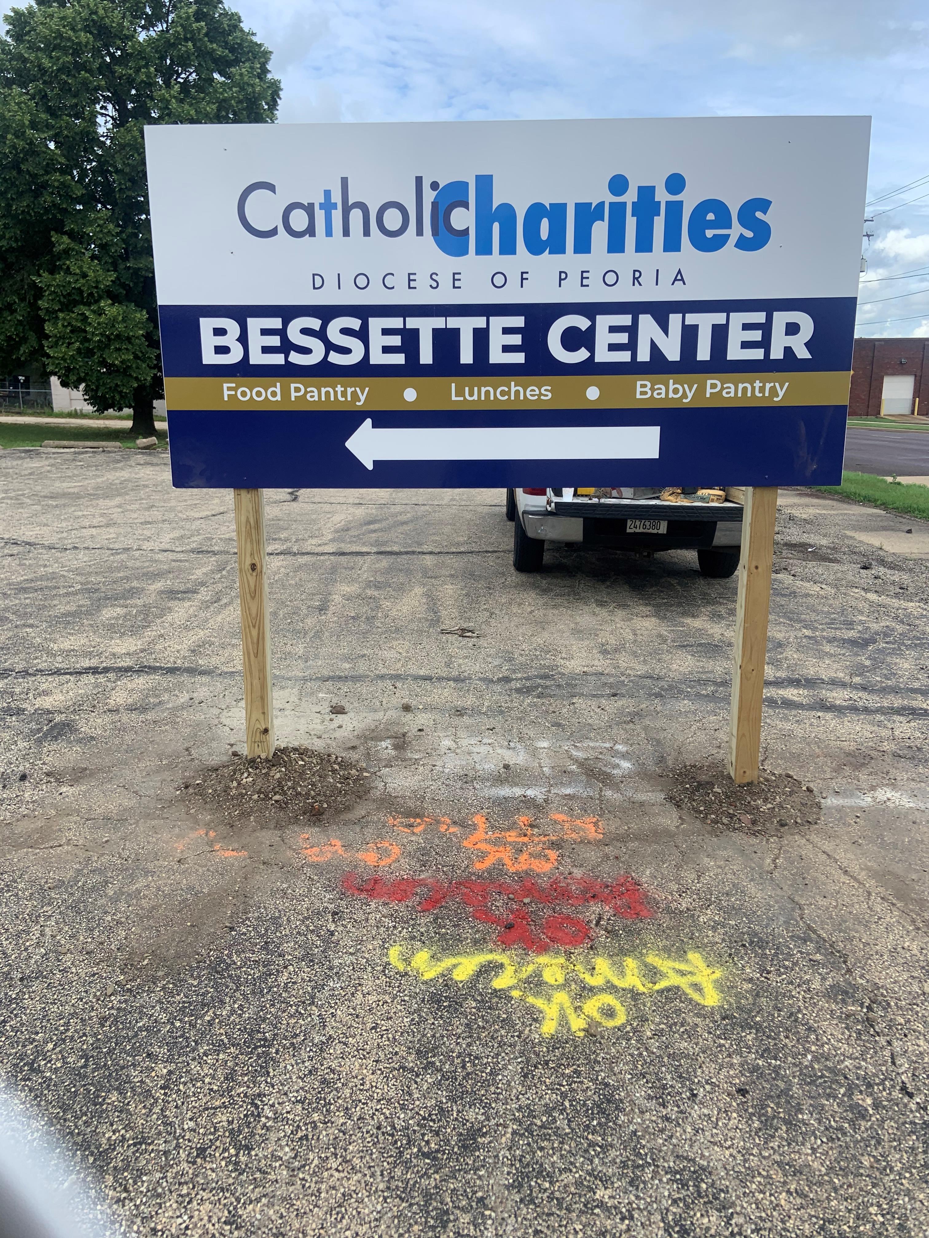 Wayfinding sign for Catholic Charities