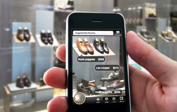 A consumer uses Augmented Reality on a cell phone to find details about shoes