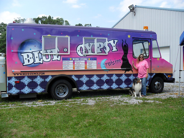 The Blue Gypsy food truck is covered in a vehicle wrap