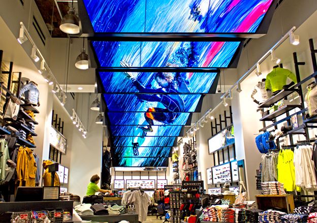 A collection of digital screens in the Tom Bradley International Terminal at Los Angeles International Airport