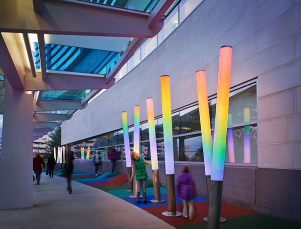 A children's hospital has colorful interior lights and carpet