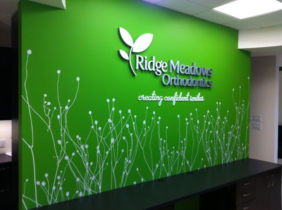 A welcoming wall at Ridge Meadows Orthodontics with a wall mural