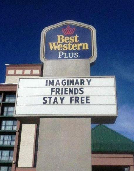 A Best Western has a sign that says "Imaginary Friends Stay Free"
