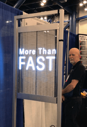 A light box displays the words "More than fast"