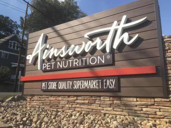 A pet nutritionist advertises their services on a monument sign