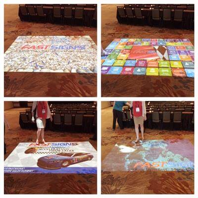 FASTSIGNS uses floor projections to share information about their offerings