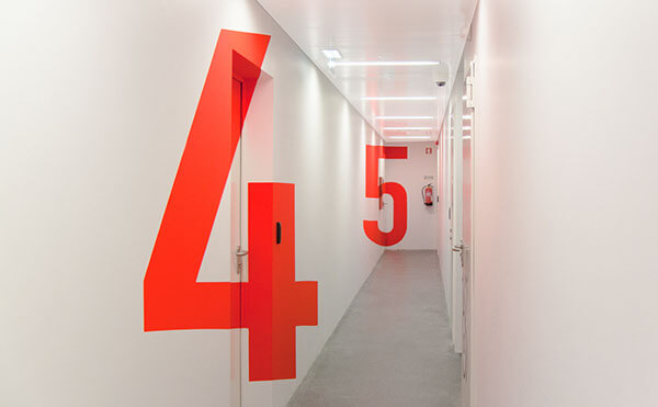 Hallway with large number 4 and 5 printed on the walls