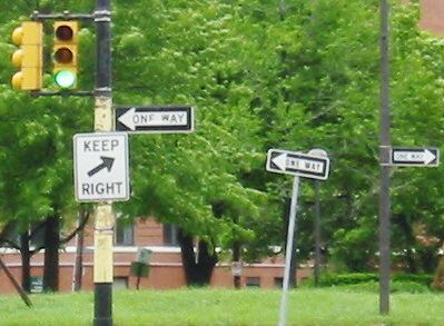 A collection of street signs provided mixed messages