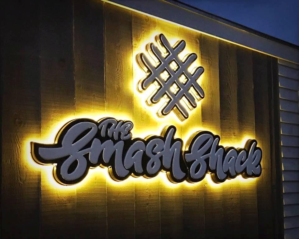 The Smash Shack uses a backlit sign to display their name and logo